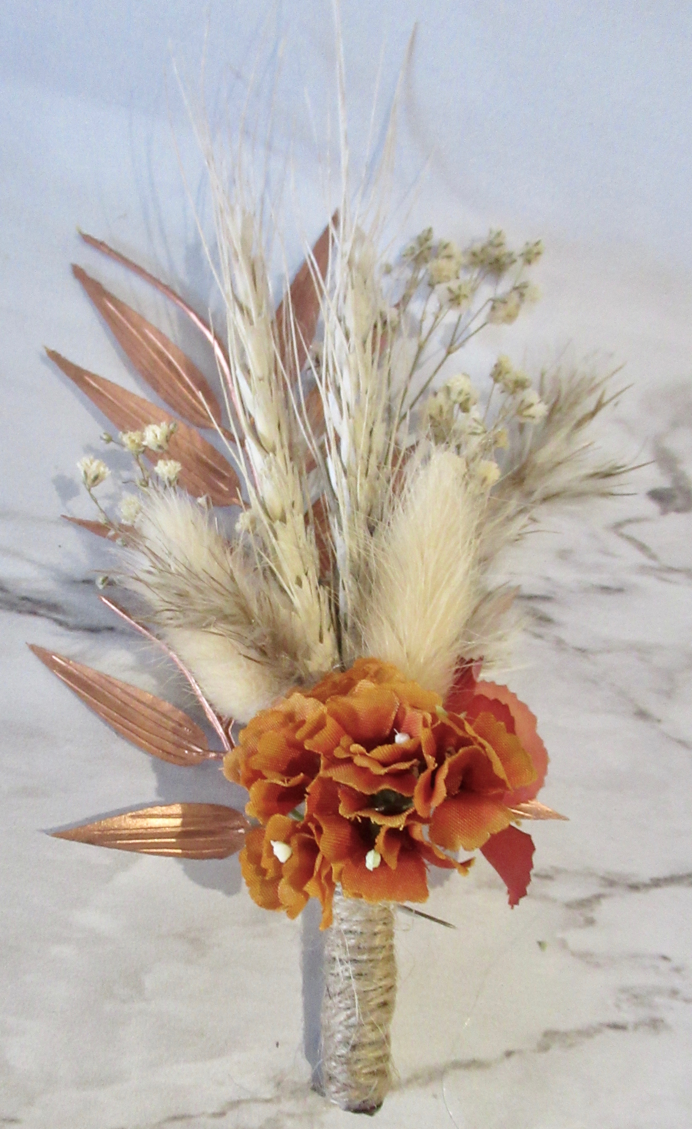 dried preserved buttonhole, burnt orange dried flower buttonhole